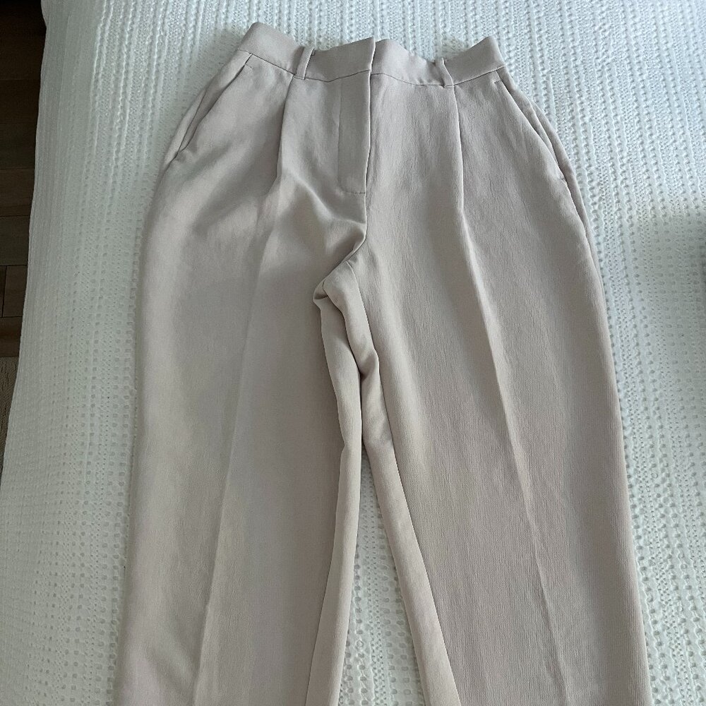 Aritzia High-Rise Wide-Leg Trousers in Light Beige
